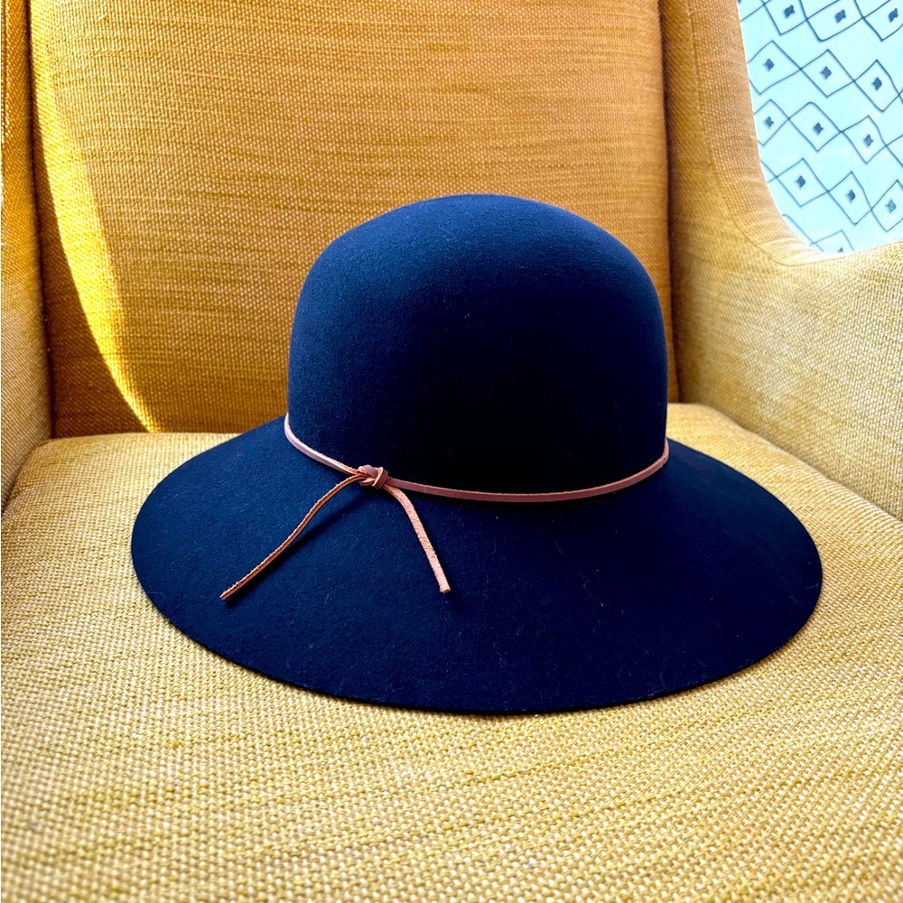 Phenix wool hat one size  with adjustable ribbon inside. Black